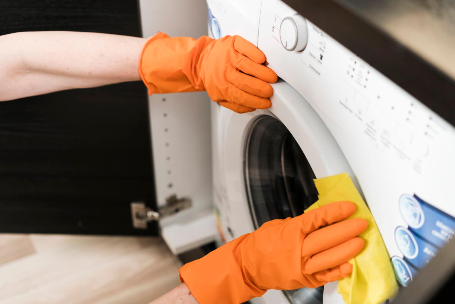 Inspecting washing machine pump for blockages causing buzzing sounds